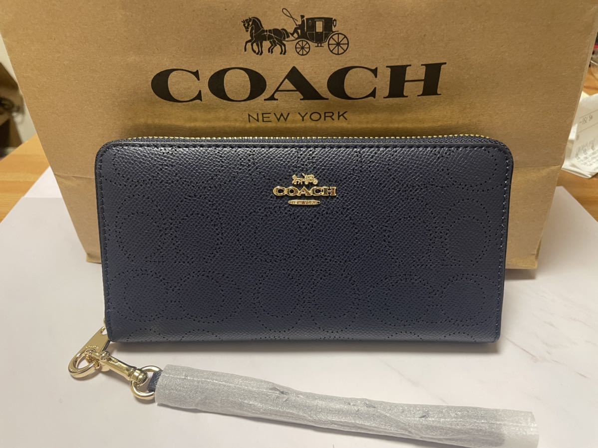 AK0069 新品未使用 COACH コーチ 長財布 アウトレット C4715 紺色 ラウンドファスナー 型抜き