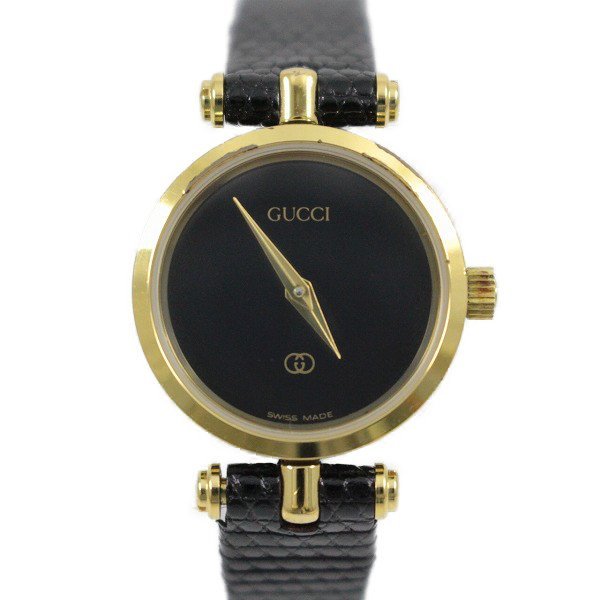 GUCCI レディース クォーツ 腕時計 ゴールド ブラック　不稼働品 グッチ ラウンド型 ブラック×ゴールド クォーツ レディース 腕時計