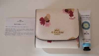 COACH コーチ 花柄モチーフ二つ折り 財布★リップクリームつき♪ 