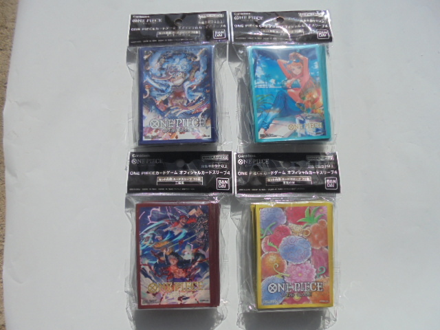 ONE PIECE ワンピース カードゲーム オフィシャルカードスリーブ 4 ルフィ ナミ 悪魔の実 三船長 計4セット 新品未開封