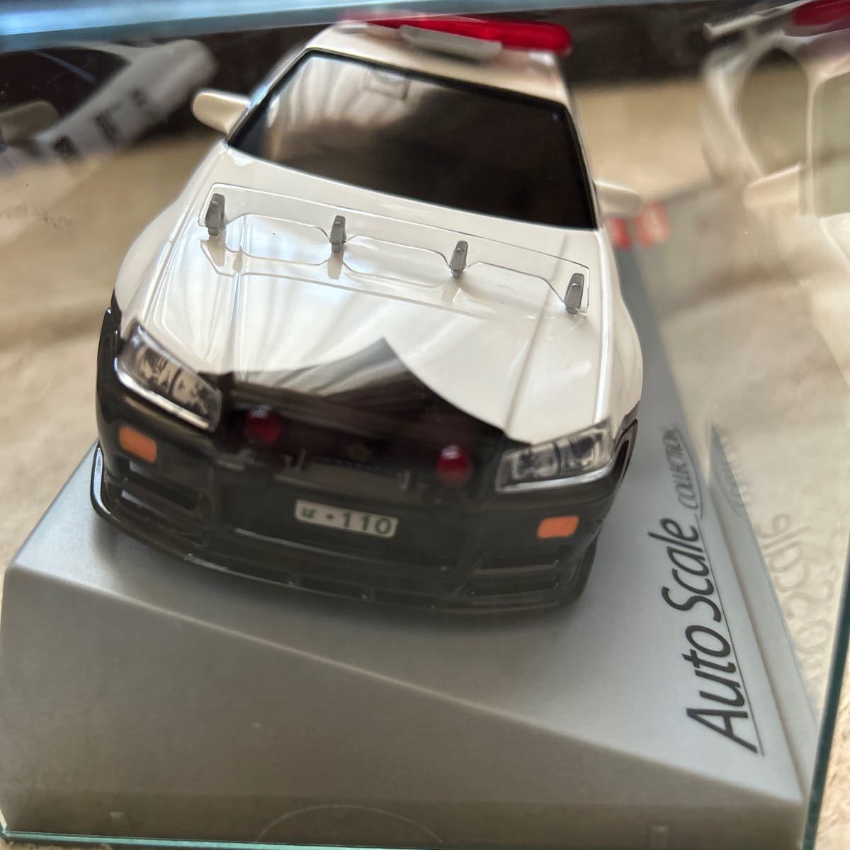 京商 R34 警視庁パトカー GT-R オートスケールコレクション - ミニッツ
