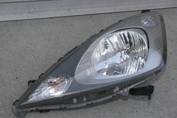 i④ホンダGE6フィット純正ヘッドライト左・H21年15974-0001(ヘッド