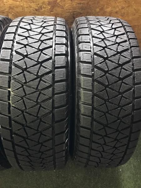 BS/BLIZZAK DM-V2 265/65R17 14年製バリ溝スタッドレス プラド サーフ等