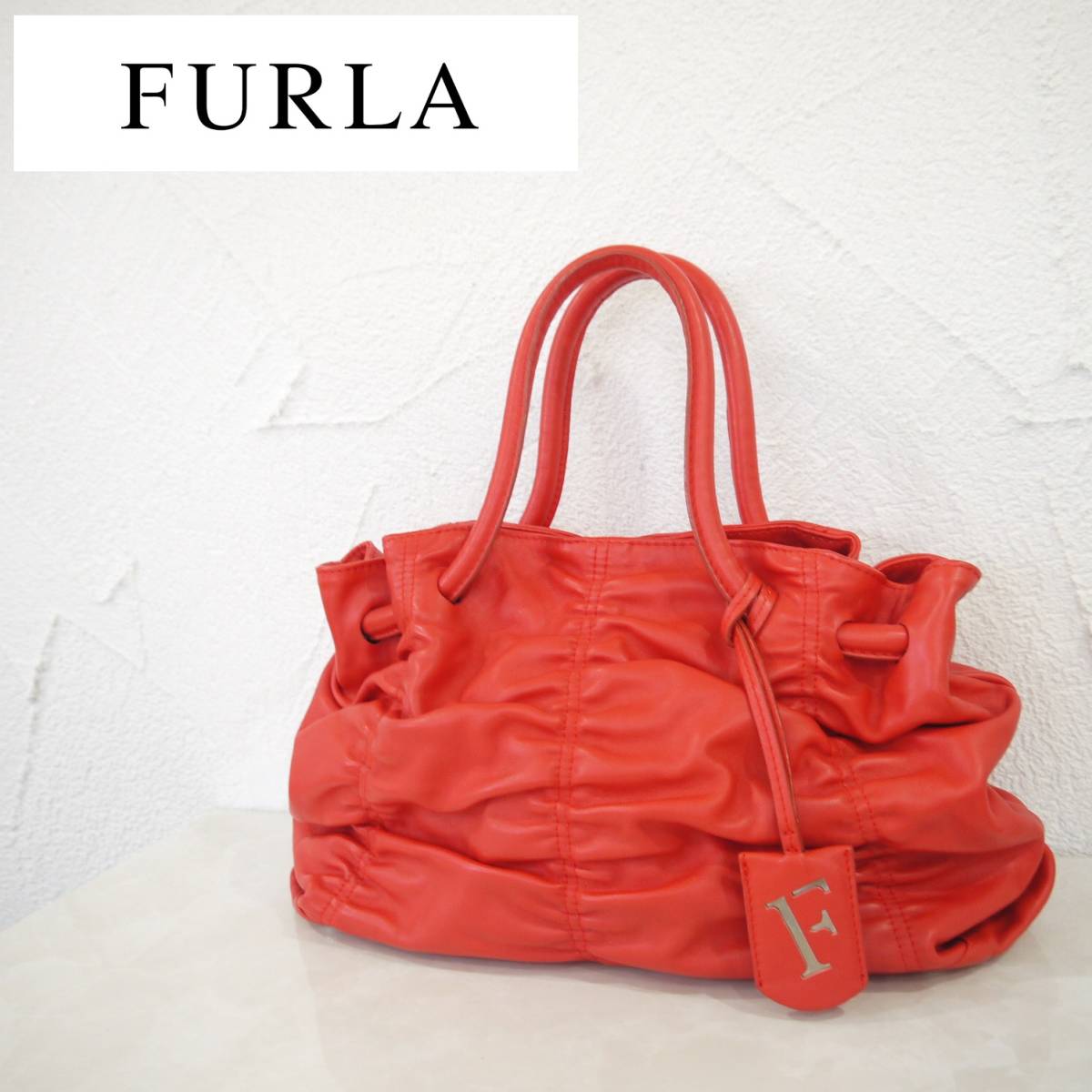早い物勝ち!! FURULA フルラ レッド シワ加工 ロゴ レザー 