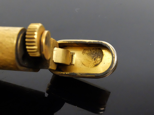 カルティエ Cartier ガスライター オーバル型 トリニティ オーバル ゴールド ローラー式 メンズ ☆外観美品☆ 喫煙具 スイス製 着火確認済み ブラウンマーブル模様 ゴールド20μ 高級ガスライ