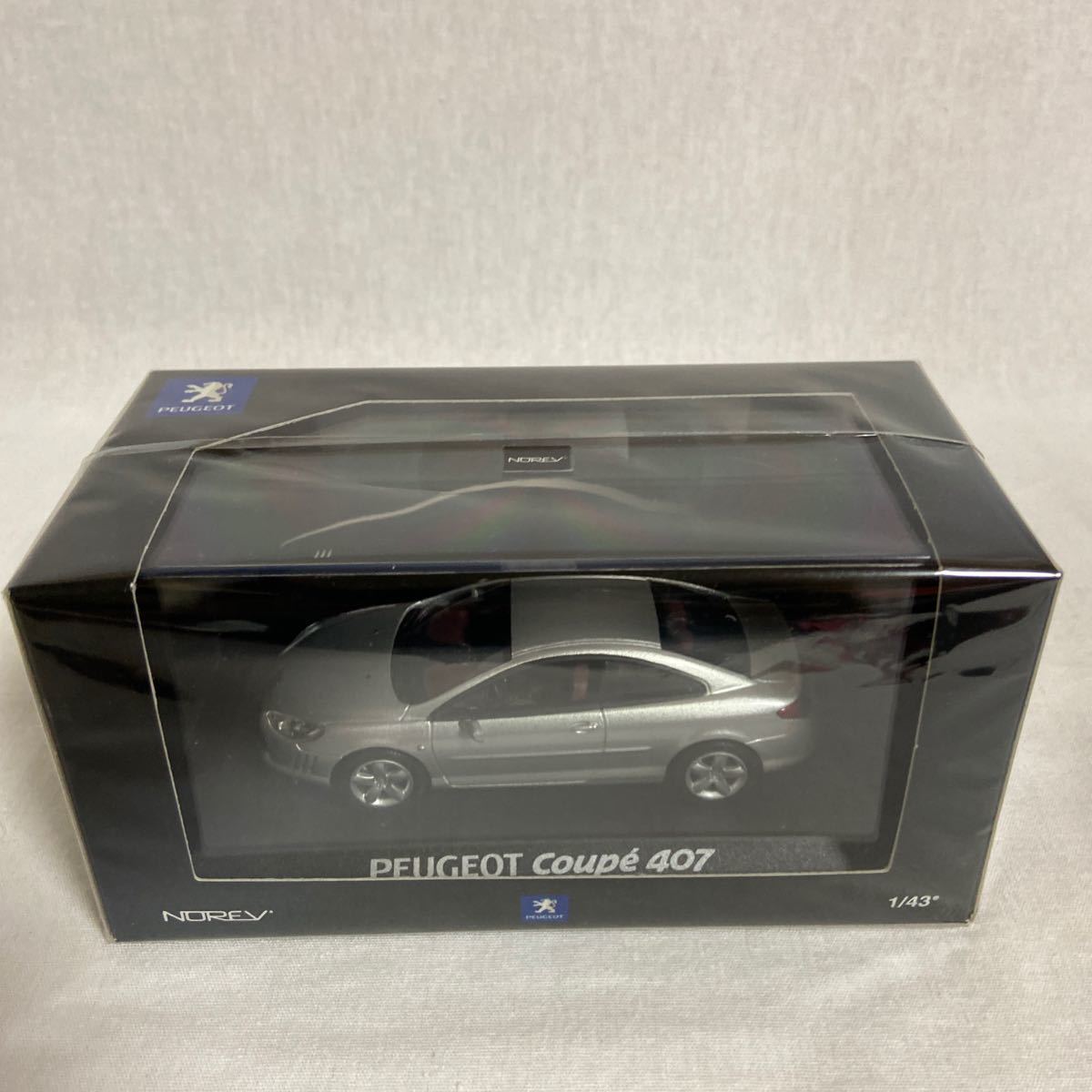 Diecast model cars Peugeot 407 coupe 1⁄43 Norev coupe grey 2005