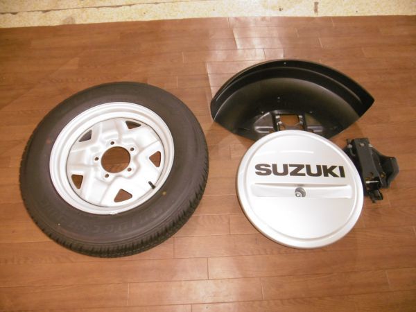 Oati07r02 Jb23w ジムニー ランドベンチャー 10型 スペアタイヤ カバー ホルダー 一式セット 新車外し リア 売買されたオークション情報 Yahooの商品情報をアーカイブ公開 オークファン Aucfan Com