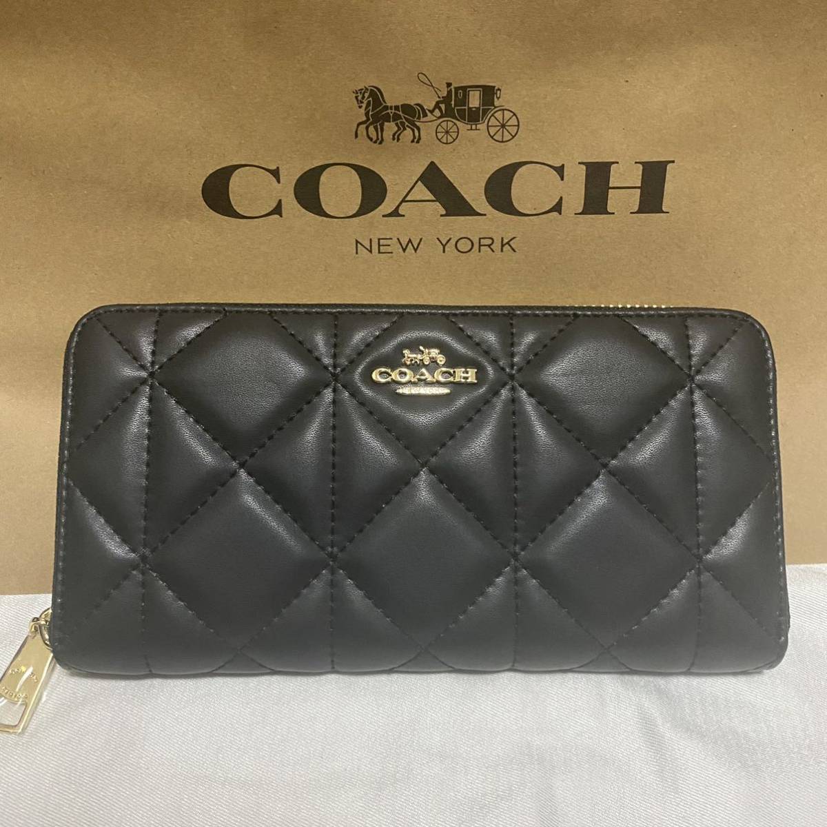 新品】コーチ キルティング ラウンドファスナー 本革 長財布 ブラック 