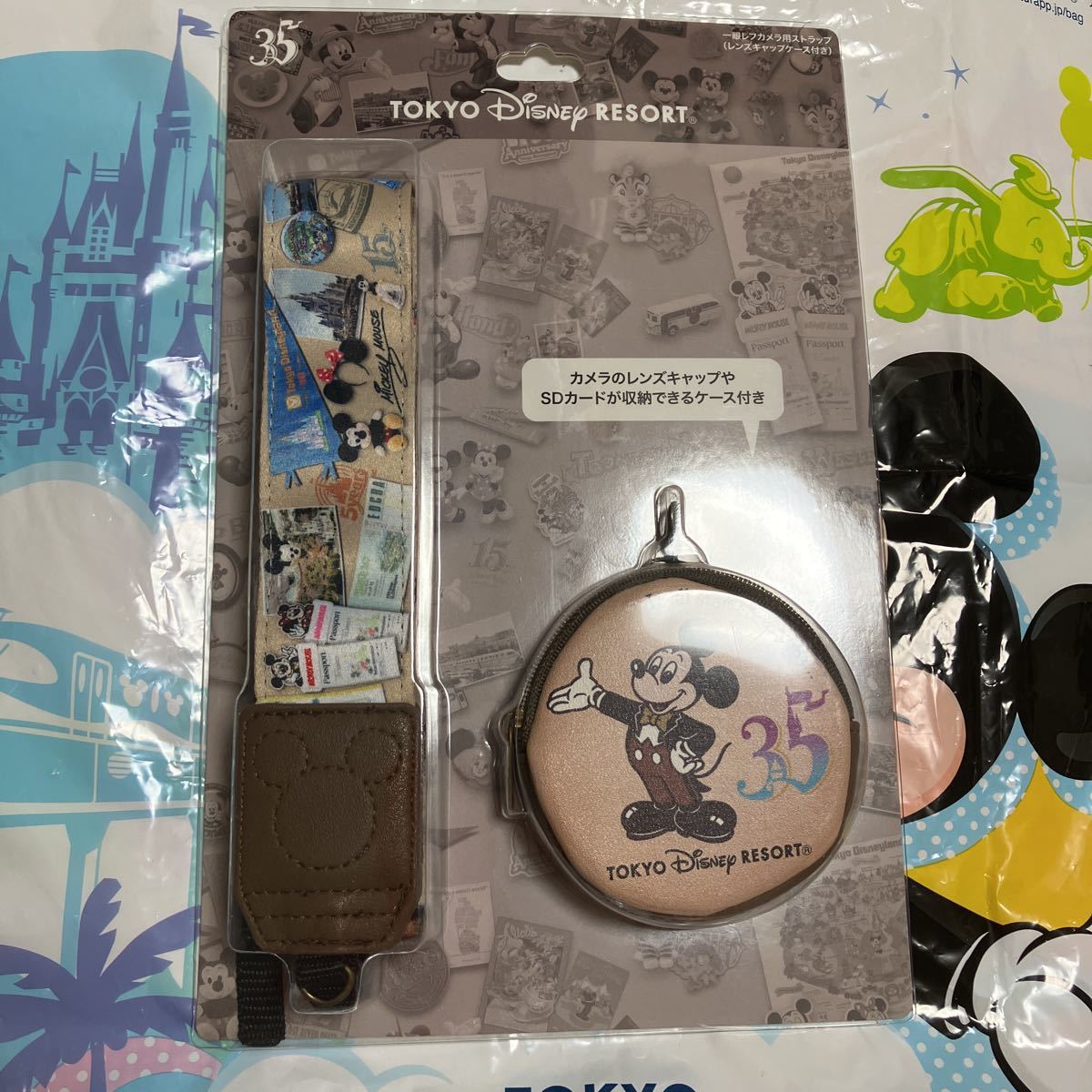 東京ディズニーランド35周年 一眼レフカメラ用ストラップ レンズキャップケース付き ヒストリー ディズニー 売買されたオークション情報 Yahooの商品情報をアーカイブ公開 オークファン Aucfan Com