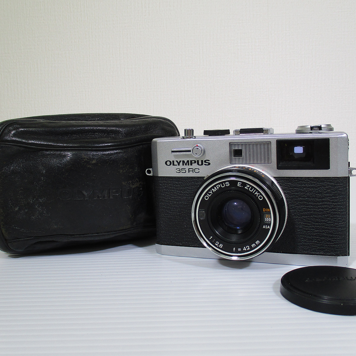 人気セール，豊富な ジャンク OLYMPUS オリンパス 35RC E.ZUIKO F2.8 42mm ケース付き A11 #0373-001(オリンパス)｜売買されたオークション情報、yahooの商品情報をアーカイブ公開 - オークファン オリンパス