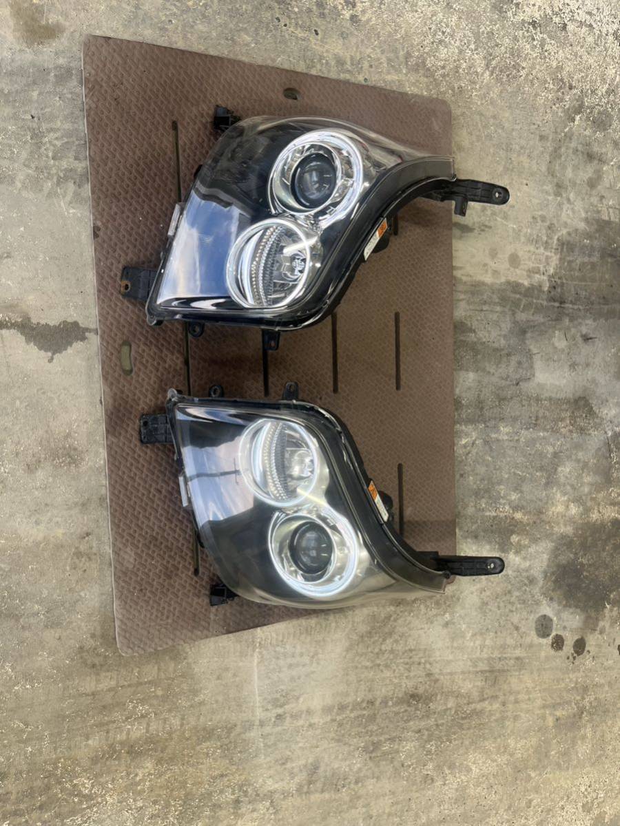 ムーブカスタム　L175S 左右ヘッドランプASSY KOITO 100-51867 HCHR-609 HID バラスト付き　左ヘッドランプ黄ばみ、くすみ有り