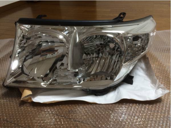 【新品】 ランクル200 純正ヘッドライト 左側