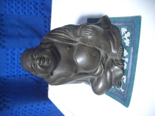 七福神の布袋様の銅像　江戸時代の人々の福の神
