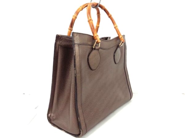 GUCCI ブロンズ レザー ハンドバッグ バンブーハンドル グッチ」の時代を超える革新美、バンブーハンドル バッグで装いに品格を