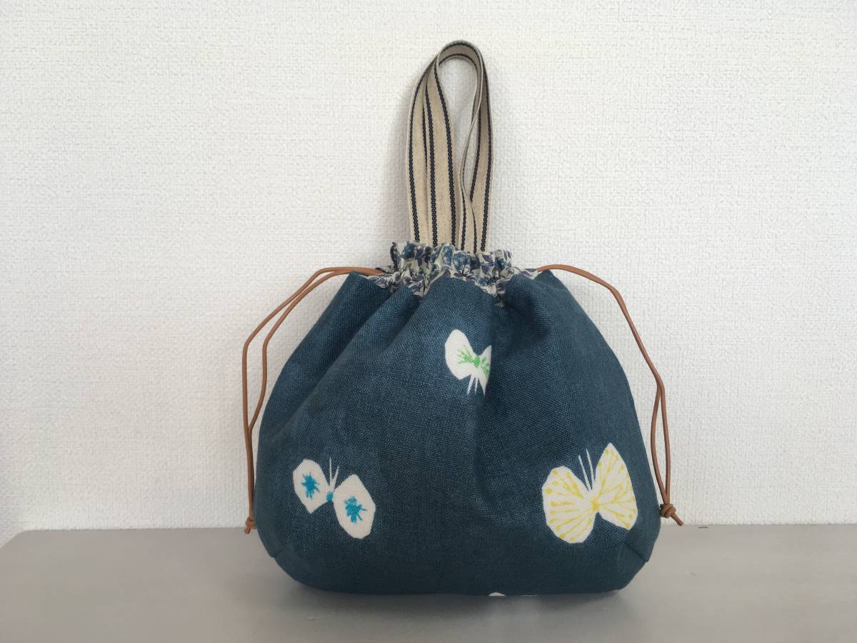ハンドメイド◆ちっちゃなまんまる巾着バッグ◆ミナペルホネン hana hane blue ×リバティ sleeping rose