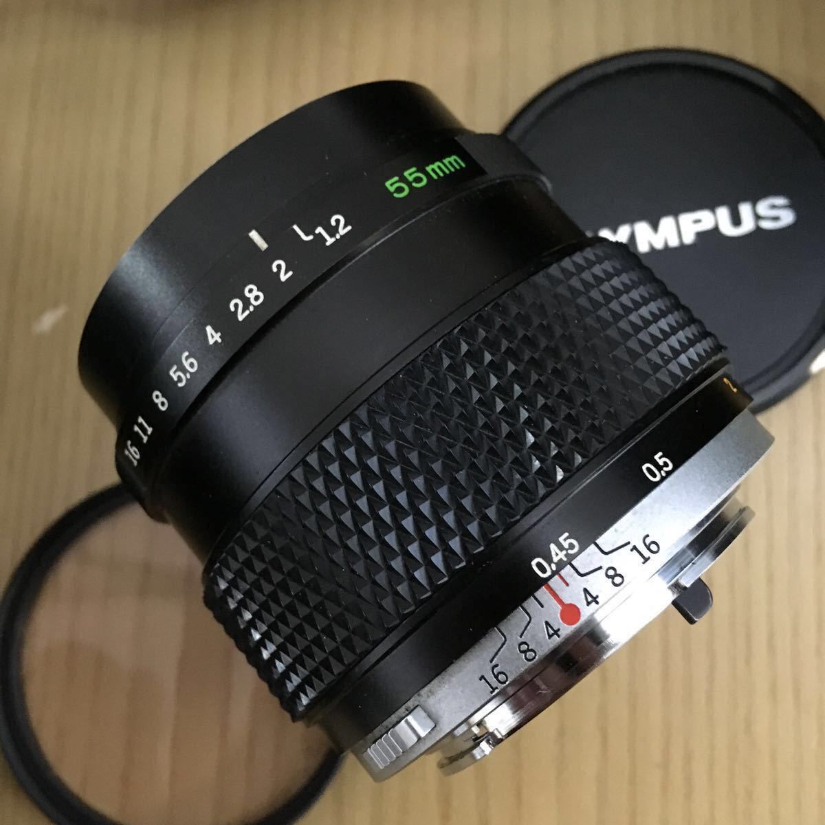 OLYMPUS M-SYSTEM G.ZUIKO AUTO-S 55mm f1.2 動作も写りもOKです。かなりキレイです。フィルターKenko SKYLIGHT [1B] 55mm、前キャップ付