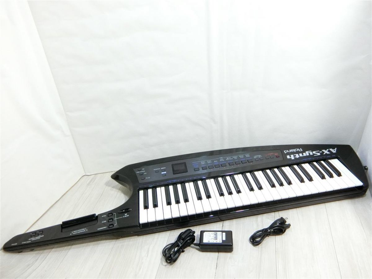 大人気，高品質 生産終了品 良品 Roland ローランド ショルダー シンセサイザー AX-SYNTH 49鍵 ブラック 専用ケース/ACアダプタ付属／BY1130-9285(ローランド)｜売買されたオークション情報、yahooの商品情報をアーカ ローランド
