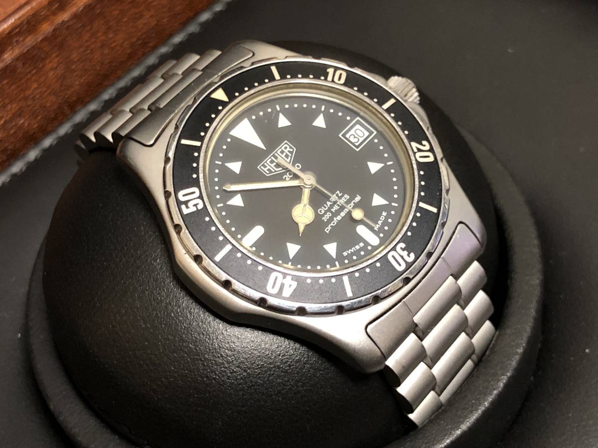 驚きの破格値，新品 HEUER 2000 オリジナル 稼働品 高精度 973.006 メンズモデル 腕周り18cm以上 1983年 TAGロゴなし ビンテージ(2000シリーズ)｜売買されたオークション情報、yahooの商品情報をアーカイブ公開 - オークフ 2000シリーズ