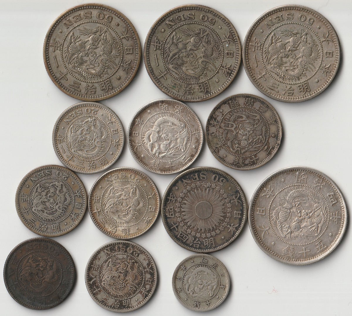 1円～　おたからや☆W0329-17　日本古銭　竜50銭銀貨　明治31年上切／旭日50銭銀貨　明治44年／旭日竜小型50銭銀貨　明治4年小竜　他計13枚