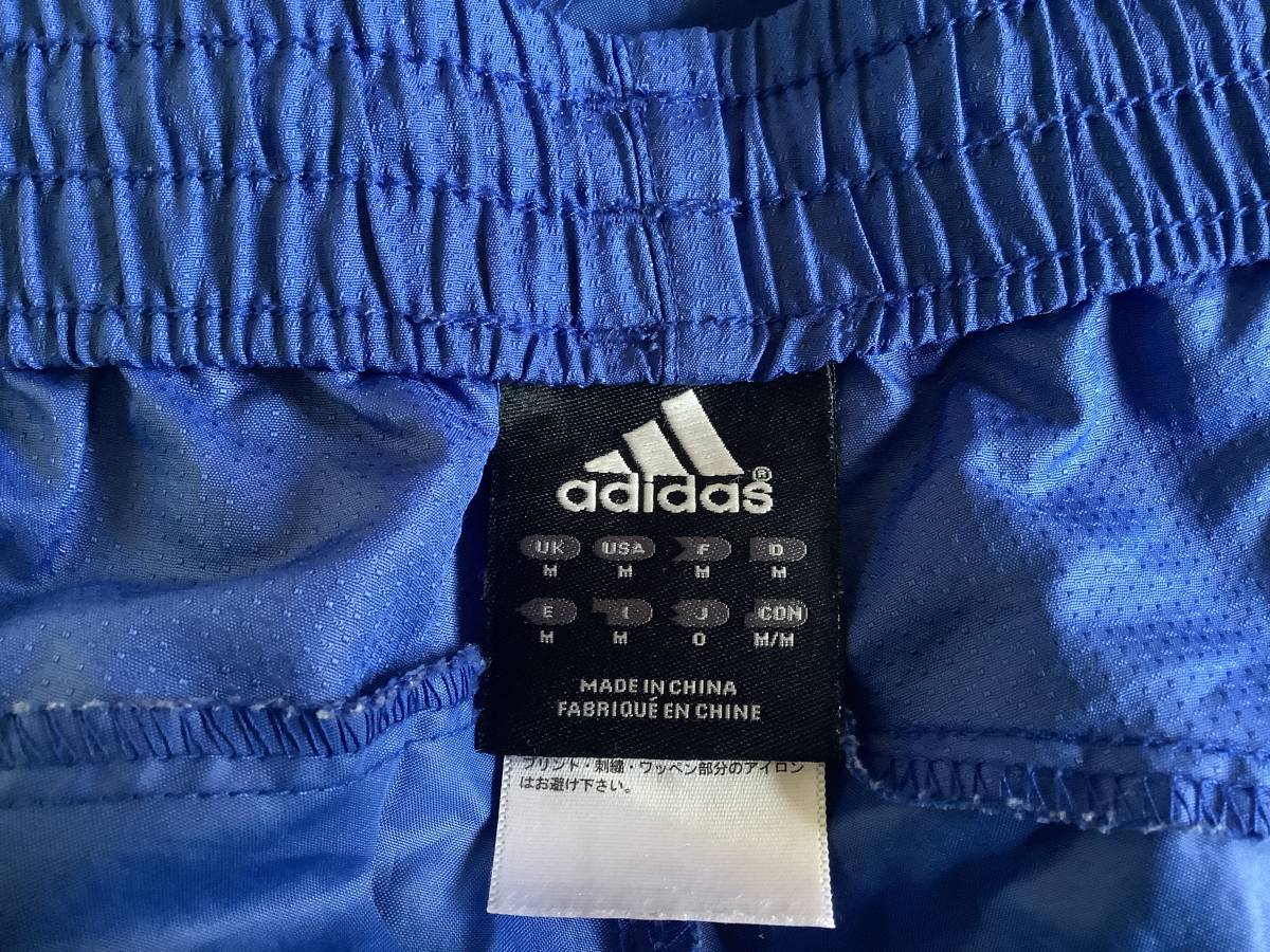 アディダス 青色ナイロンパンツ Oサイズ シャカパン ジャージ 長ズボン 破れあり ブルー アディダス 売買されたオークション情報 Yahooの商品情報をアーカイブ公開 オークファン Aucfan Com