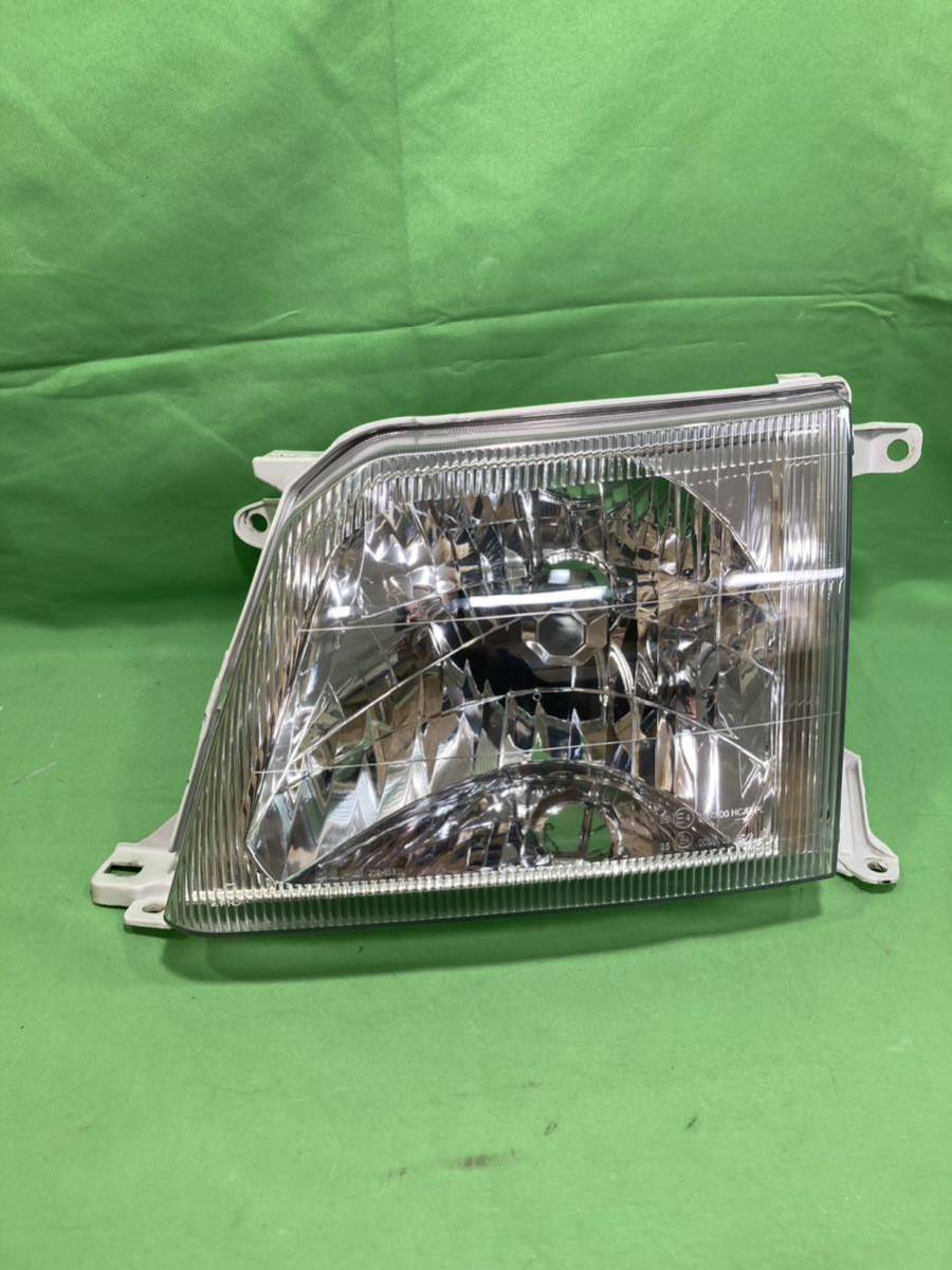 トヨタ ランドクルーザープラド 90系 社外製 左ヘッドライト ハロゲン 取り付け補修と内部傷があります DEPO 212-11B1 個人宅配送不可