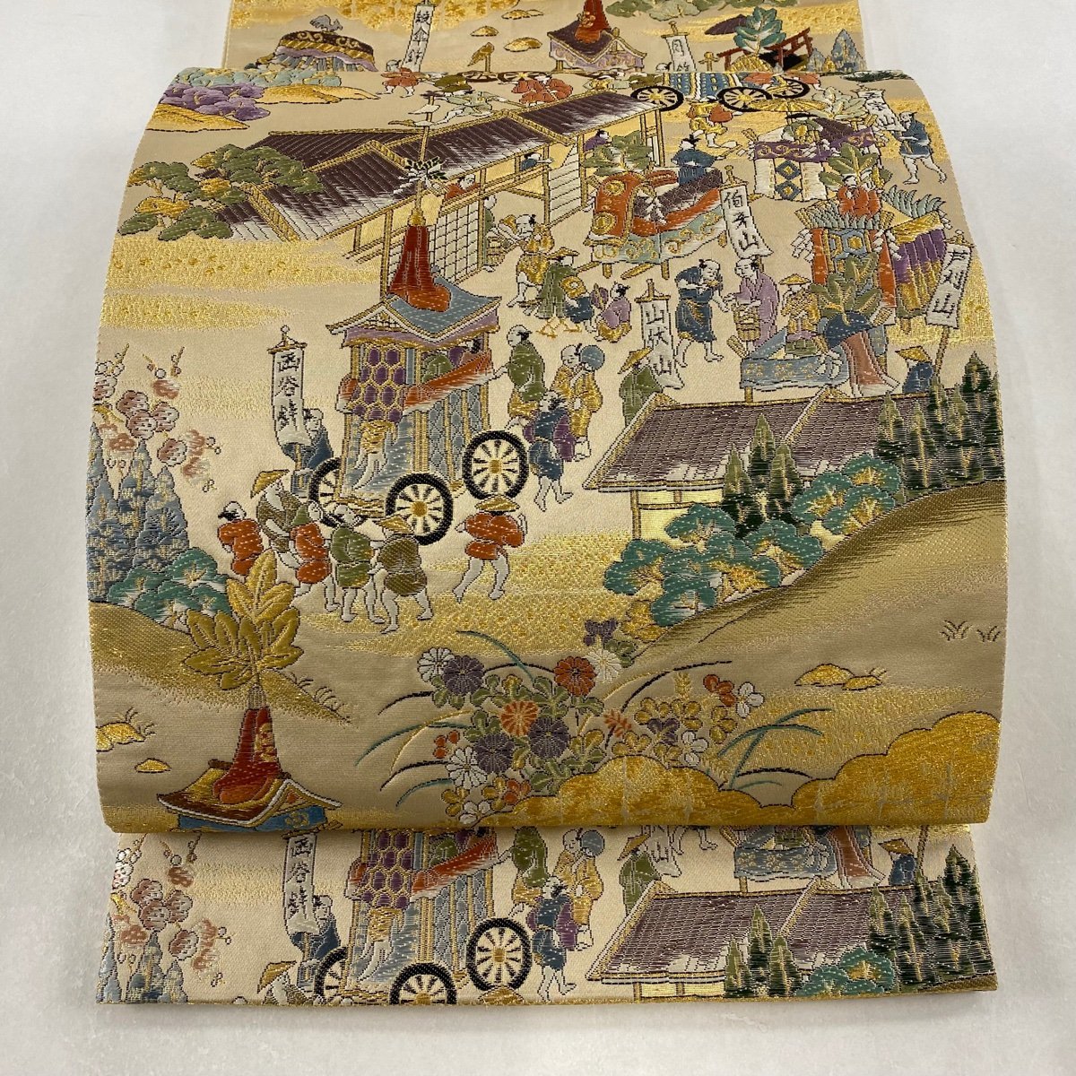 袋帯 美品 秀品 人物 御所車 唐織 金糸 薄茶色 お太鼓柄 正絹 【中古