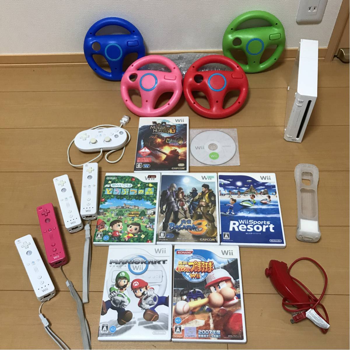 Wii☆豪華マリオカートセット☆リモコン4個☆ソフト7個☆新品ハンドル4個セット-日本国内配送