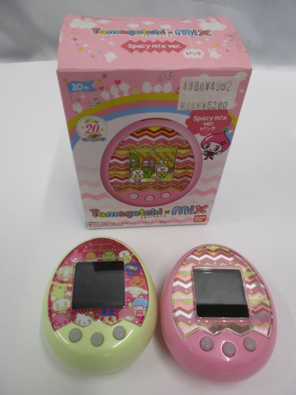 Kt0518 たまごっち 2個セット サンリオ キャラクターズ たまごっちみくす Spacy M X Ver ピンク ベージュ 通電確認品 たまごっち 売買されたオークション情報 Yahooの商品情報をアーカイブ公開 オークファン Aucfan Com