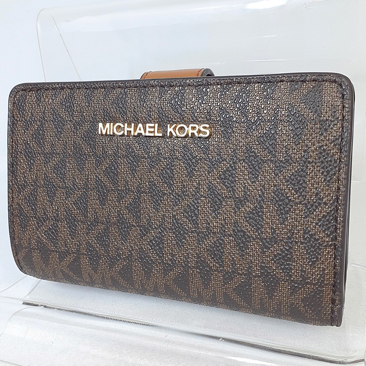 ◆ 【商品ランク:B】マイケルコース MICHAEL KORS MKシグネチャー ロゴメタル 二つ折り 財布 ウォレット 7カード 小銭入れ有 ブラウン 茶系