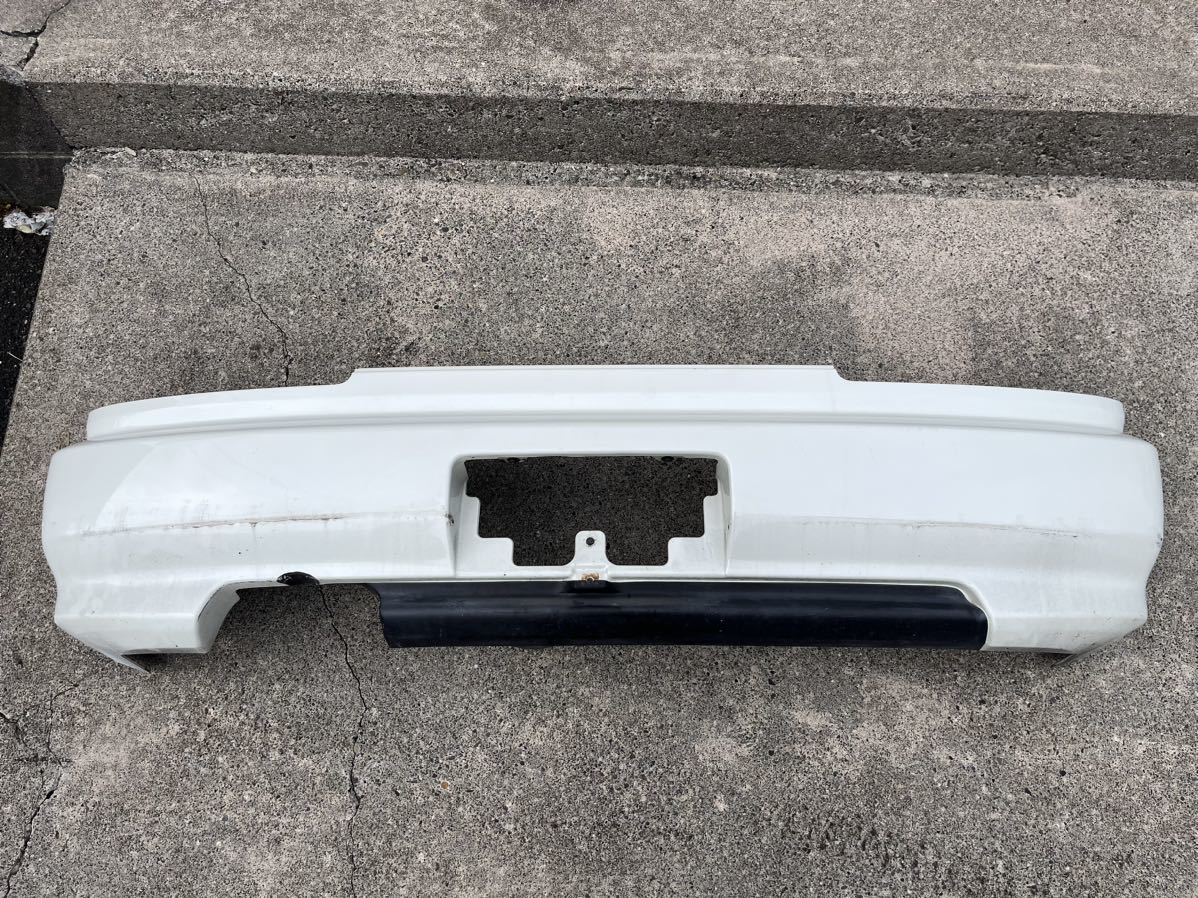 ER34 純正リアバンパー 4ドア セダン パールホワイト スカイライン R34
