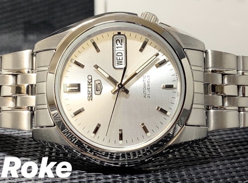 新作入荷，得価 SEIKO5 セイコー5 日本製 自動巻き 機械式 腕時計 シルバー セイコー5ロゴ文字盤 裏ブタスケルトン ビジネスウォッチ カレンダー(海外モデル)｜売買されたオークション情報、yahooの商品情報を 海外モデル