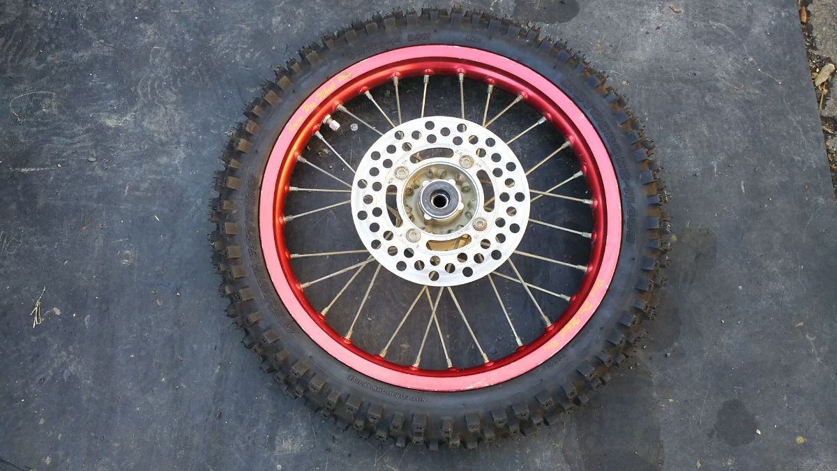 KX65フロントホイール新品タイヤ付