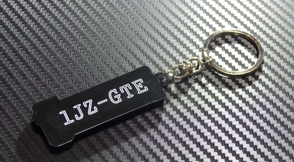 裏文字グレー 1JZ-GTE エンジンヘッドカバー型キーホルダー JZX100