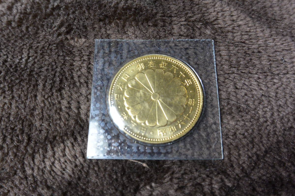 天皇陛下御在位60年記念 | 御在位60年記念硬貨セット 10万円 10万円金貨 ☆送料無料純金天皇陛下 10万円金貨幣 東京書芸館公式通販 昭和61年 昭和天皇御在位60年記念金貨』10枚セット 貨幣 天皇御在位 六十年記念 1万円銀貨幣 500円白銅貨幣 1万円金貨幣プルーフ貨幣