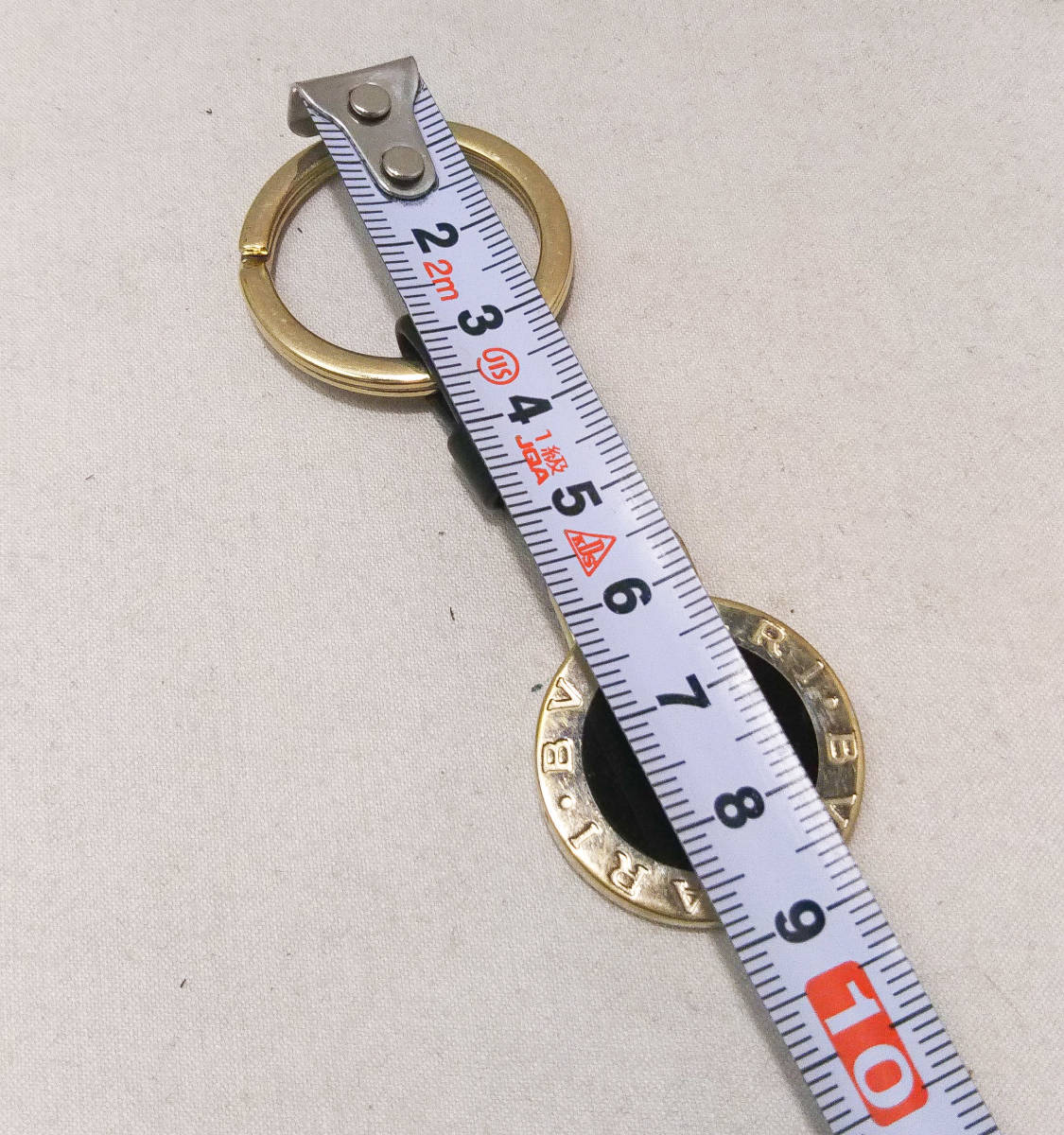 BVLGARI 32764 キーホルダー ブラック ゴールド 参考定価:27500円 店舗