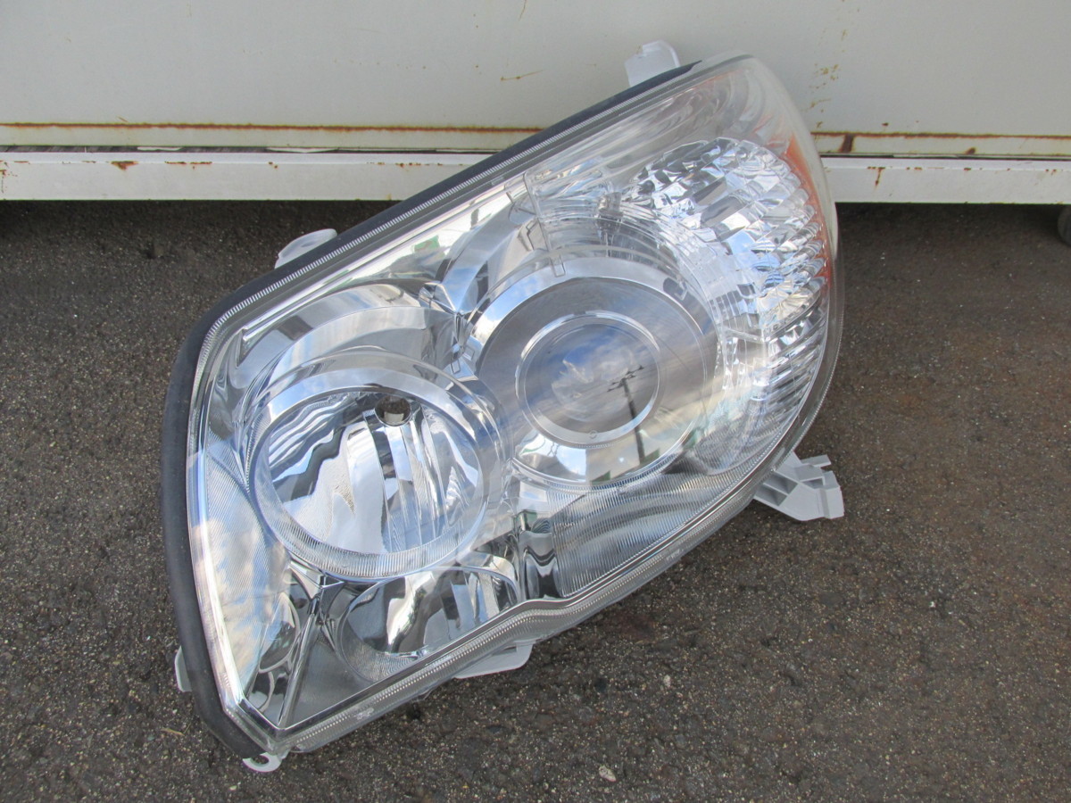 新車外し】トヨタ 純正 ヘッドライト 左 ハイラックス サーフ 後期 210