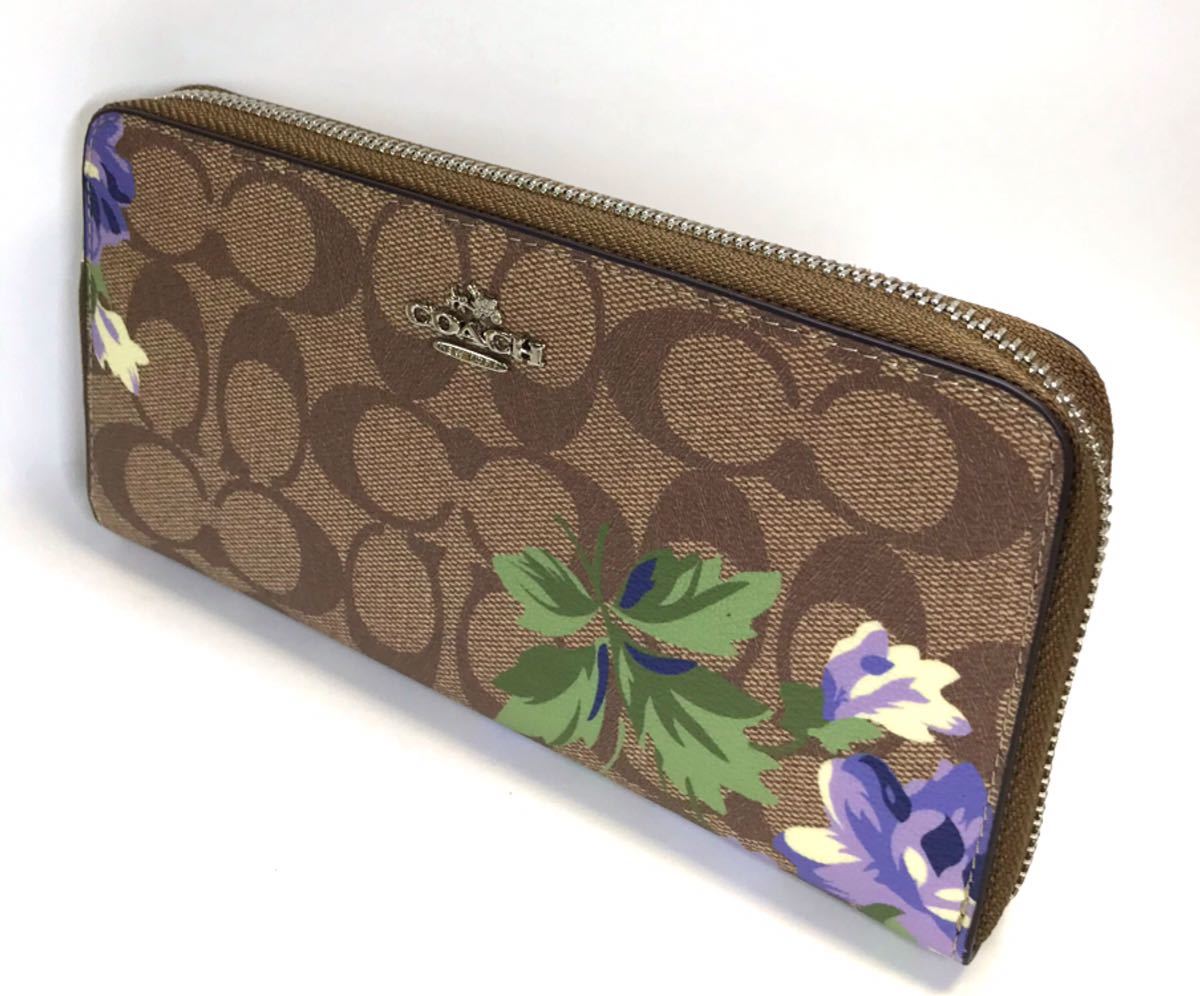 コーチ COACH茶色のシグネチャーに紫の花が美しいジップ アラウンド長 