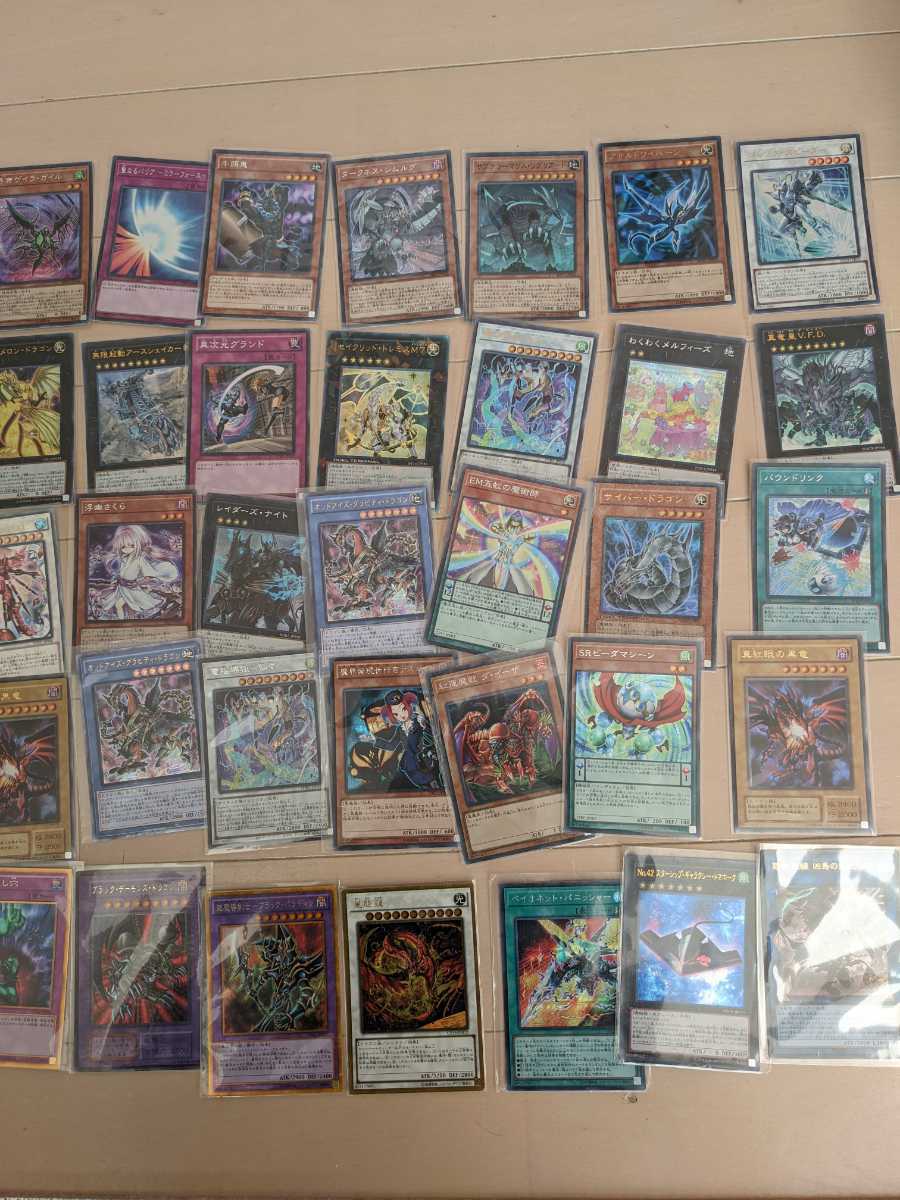 遊戯王 レリーフ 引退品 引退処分品 プリシク、シークレット、レリーフ等大量 等 遊戯王 引退 まとめ売り シークレット、レリーフ、レア 大量 1200枚以上 美品