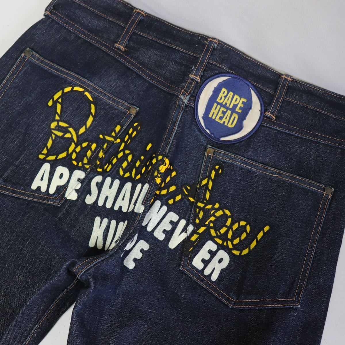 希少【a bathing ape】ロゴ ペイント champion/濃紺 デニム パンツ 