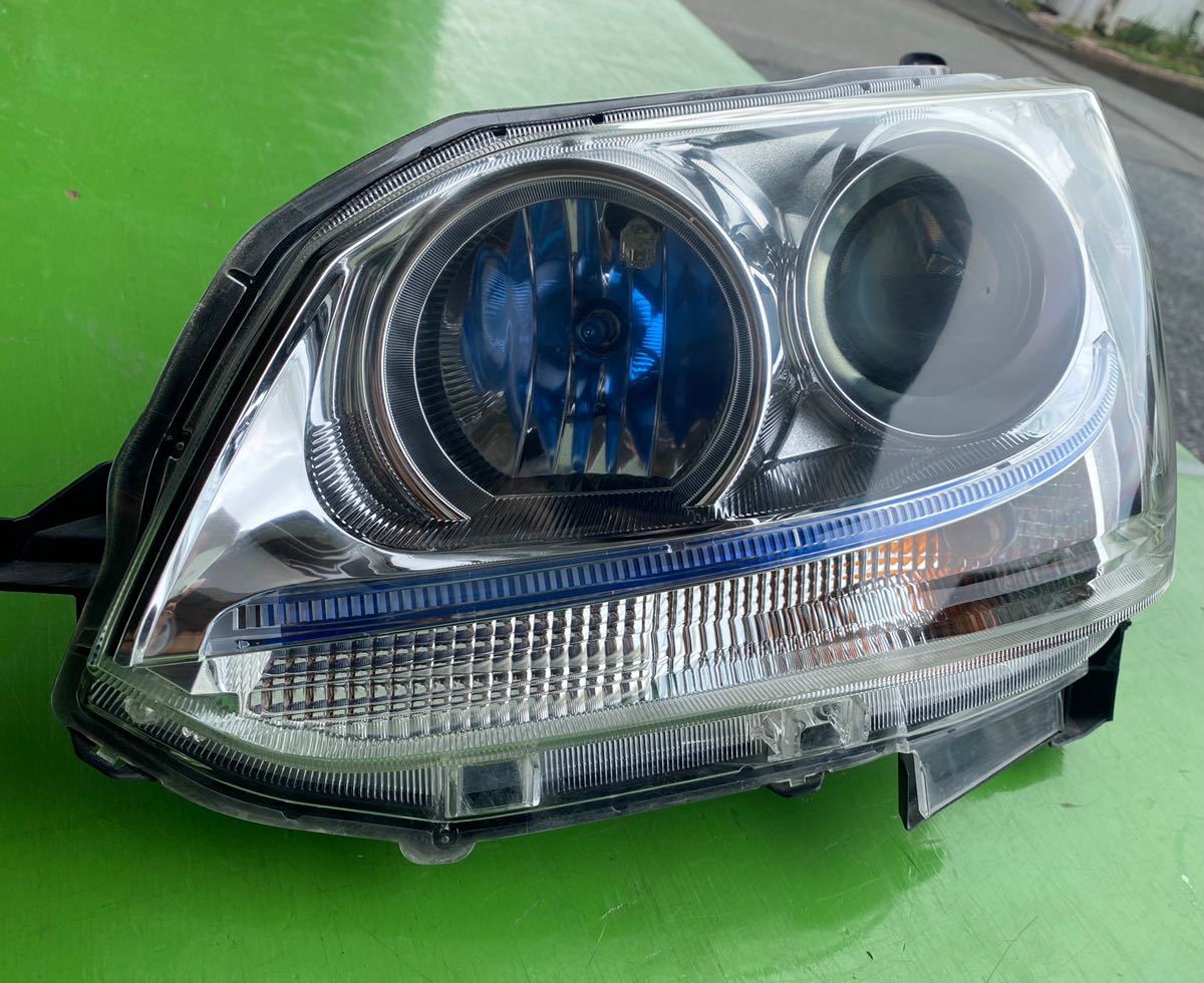 LA100S 前期 ムーヴカスタム 純正 HID 左 ヘッドライト 87914