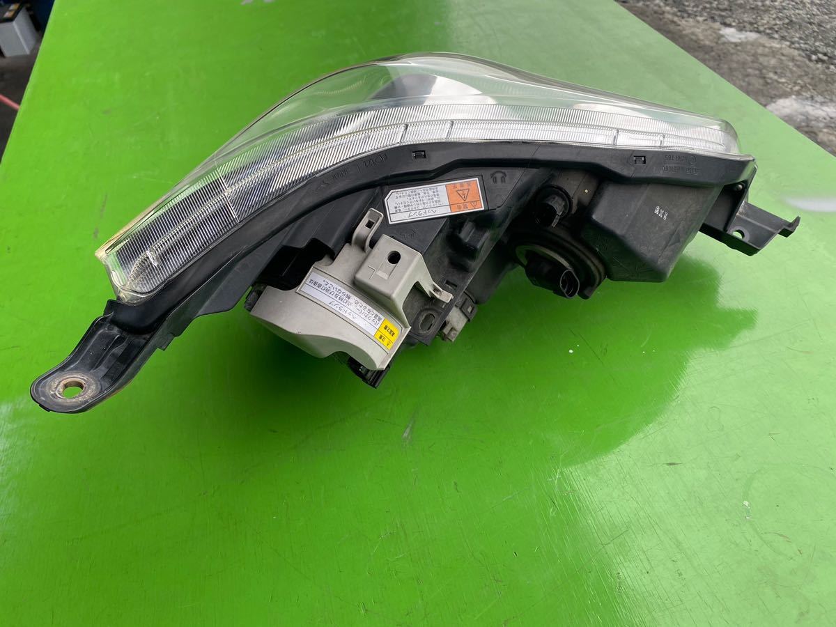 LA100S 前期 ムーヴカスタム 純正 HID 左 ヘッドライト 87914