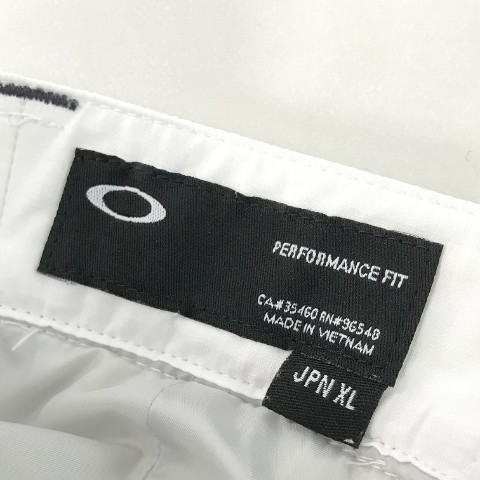 オークリー OAKLEY Oakley ホワイト - パンツ ナイロンパンツ スカル メンズゴルフパンツ ホワイト系 0 裏起毛 中綿 ロングパンツ メンズ PUFF
