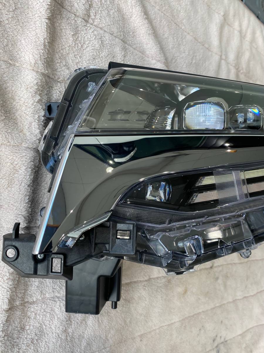 距離約15000km 左 ヘッドライト ヘッドランプ アルファード  