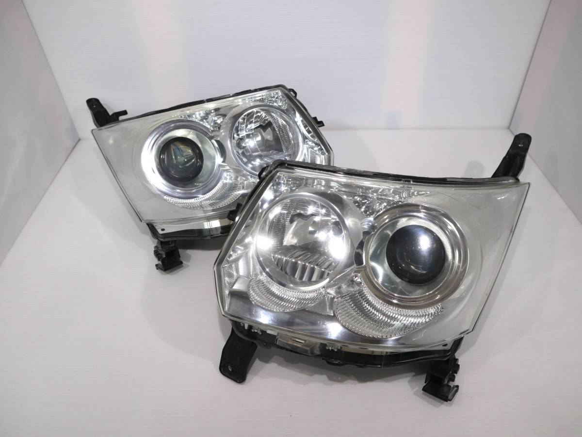ムーヴカスタム ヘッドライト KOITO 100-51990 キセノン HID 新作，爆買い】 HID 【コーティング済】 キセノン 迅速発送 車検〇