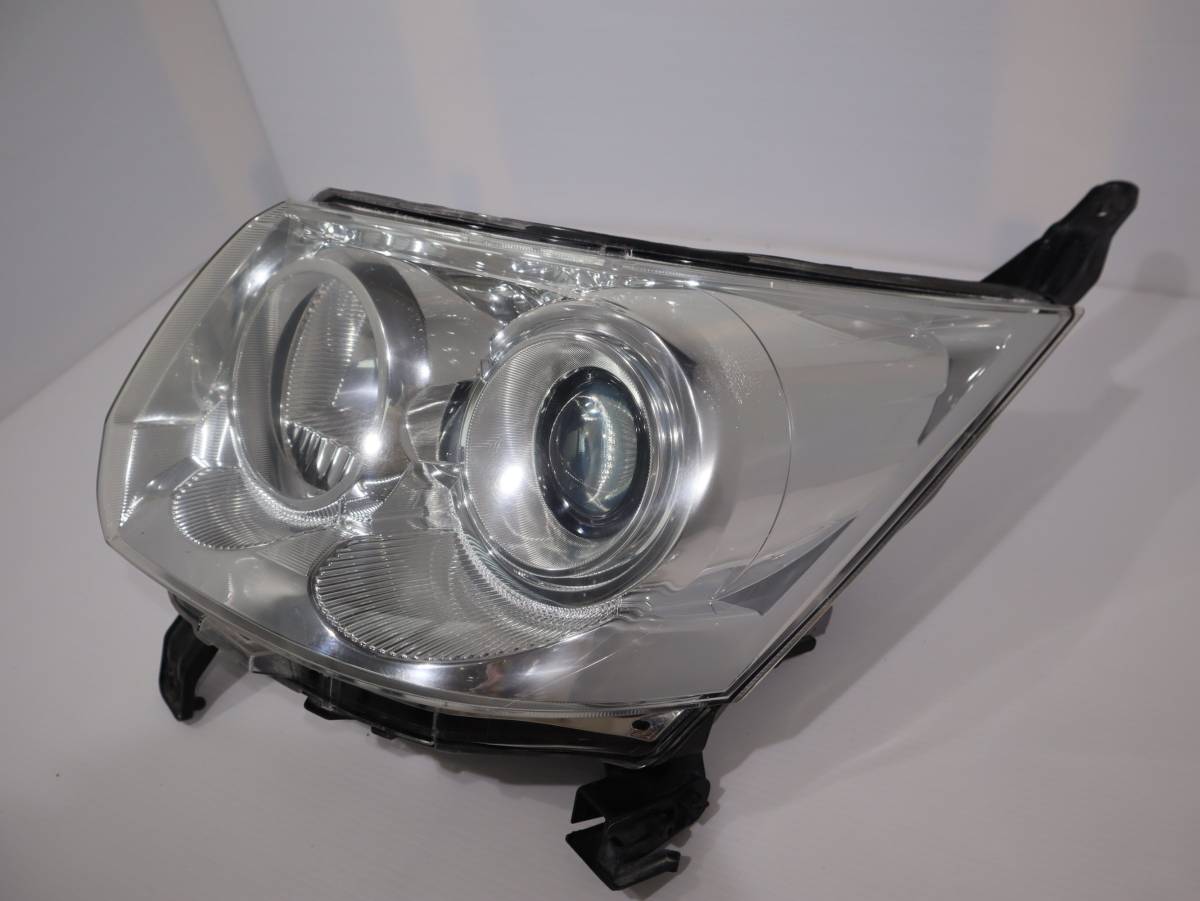 ムーヴカスタム ヘッドライト KOITO 100-51990 キセノン HID 新作，爆買い】 HID 【コーティング済】 キセノン 迅速発送 車検〇