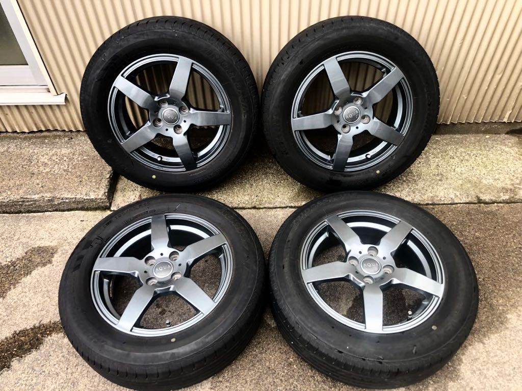 15x5.5J オフセット＋45 PCD100 4H 185/65R15 ブリジストン ネクストリー BRIDGESTONE ECOPIA NEXTRY AQUA アルミ4本セット ティーダ他 