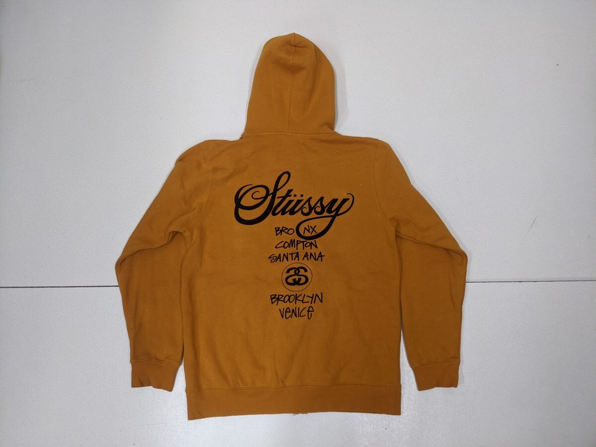 11．STUSSY デカロゴ ワールドツアー プリント ジップアップ 