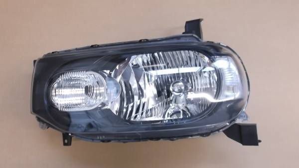 Z１2キューブ純正キセノンヘットライト左側