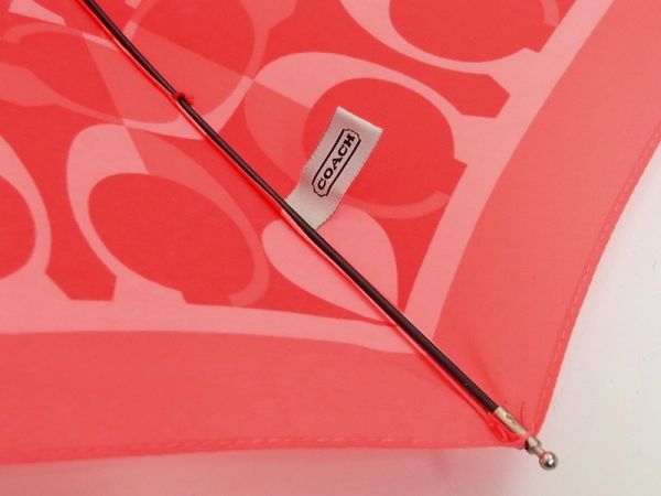 L1649【美品】コーチ/COACH*ペイトン*シグネチャー* ワンプッシュ式◎8本骨/折り畳み傘/カサ/雨傘*ピンク系*F66637