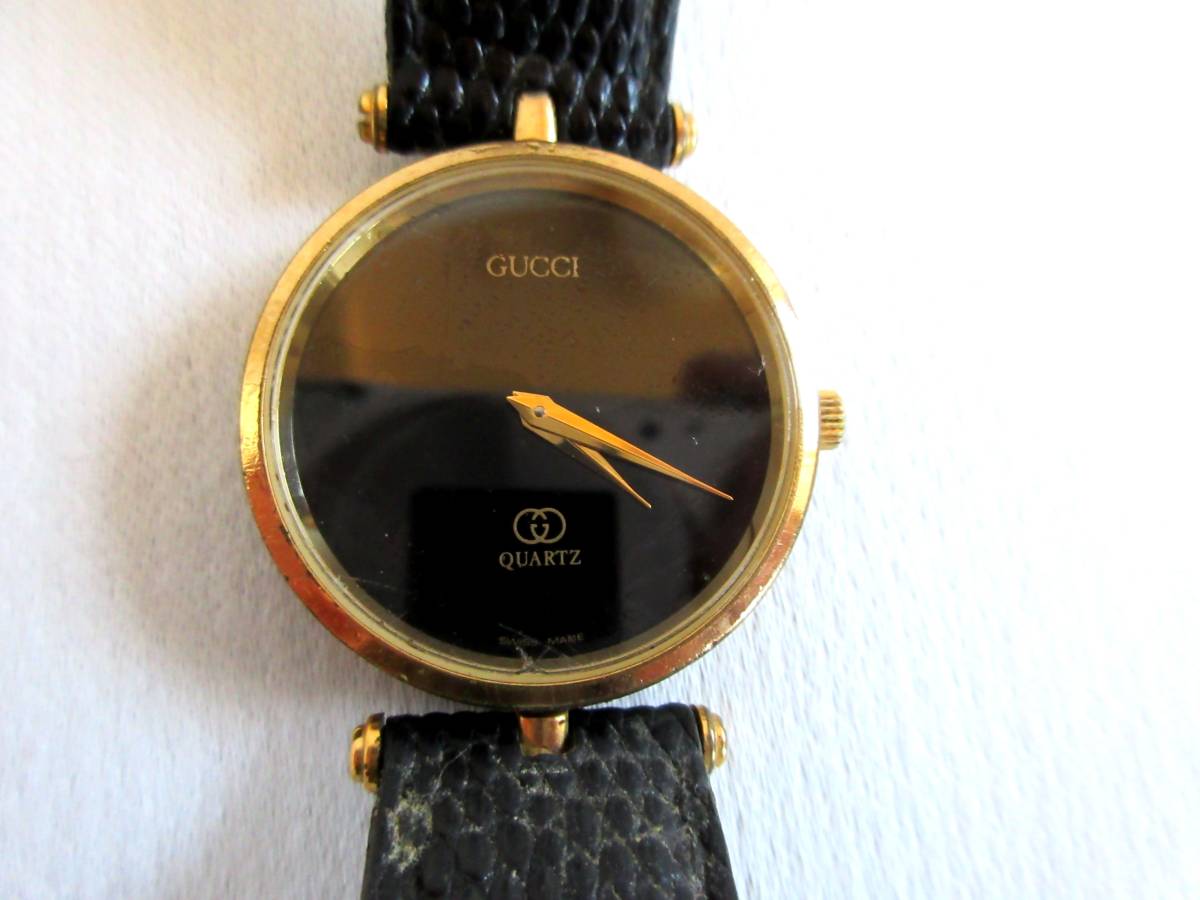 GG146★1円★グッチ GUCCI ユニセックス 腕時計 クオーツ 黒 ゴールド GGロゴ メンズ レディース